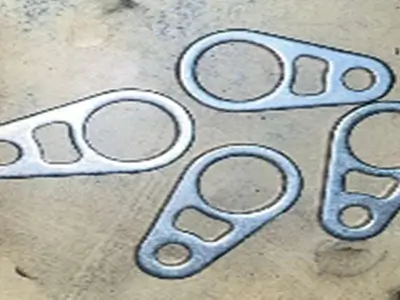 Precision sheet metal exhaust flanges manufactured in SS304, SS409, and mild steel for automotive and industrial applications.